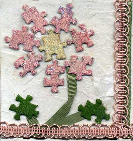 4 x 4 layout with puzzle pieces forming flower