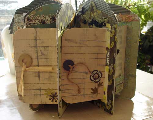 altered board book fanned open to display doors