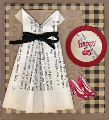 greeting card featuring an origami dress made with pages from a book
