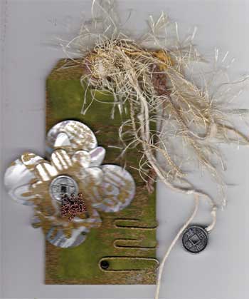 grunge tag with distressed metal flowers