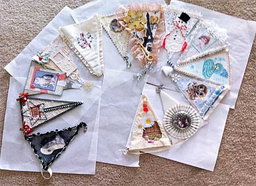 series of 12 holiday pennants assembled into a banner