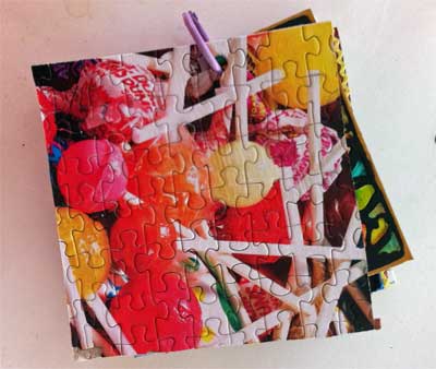 fat book cover made from jigsaw puzzle